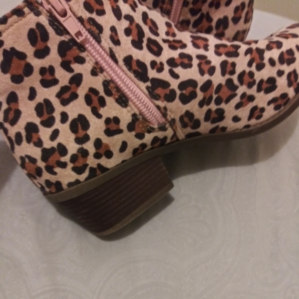Cheetah printed ankle boots.